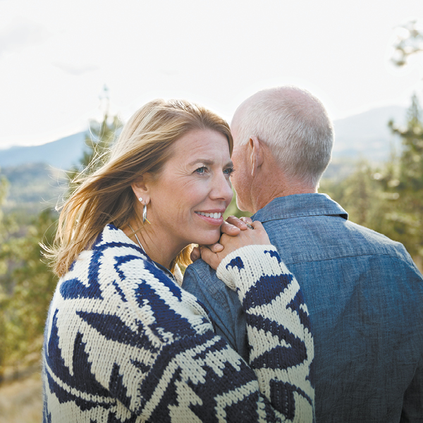 Older couple embracing outdoors